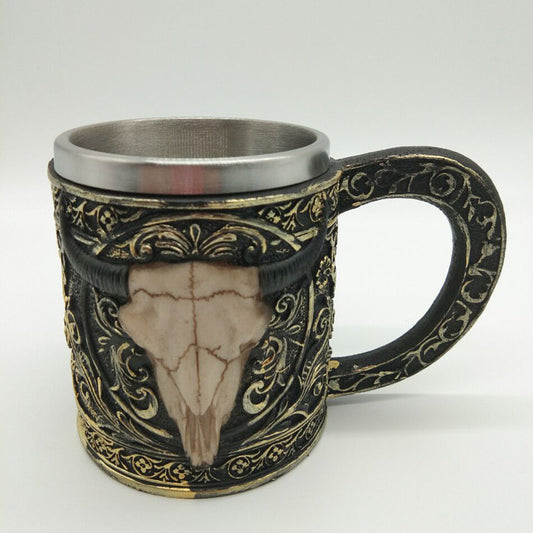 Carved resin skull and sheep head cup