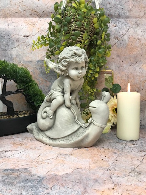 Cherub on Snail Garden Statue, Whimsical Resin Angel Sculpture, Durable Indoor/Outdoor Decor, Charming Graveside Memorial Figurine-Osiris Craftworks