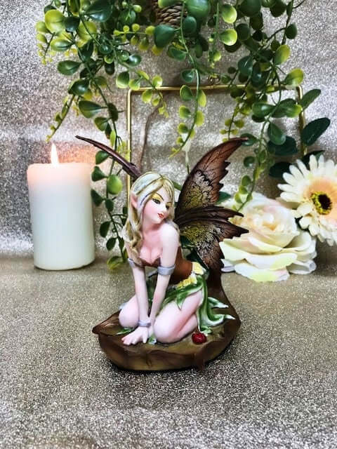 Enchanted Green Flower Fairy Figurine, Mystical Fairy Resting on Leaf Statue, Whimsical Fantasy Ornament, Enchanting Home Decor-Osiris Craftworks