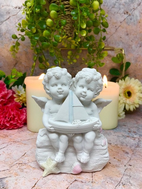 Cherubic Angels with Sailboat Figurine, Nautical Resin Decor, Twin Cherubs Statue, Coastal Nursery Accent, Serene Angelic Whimsical Ornament-Osiris Craftworks