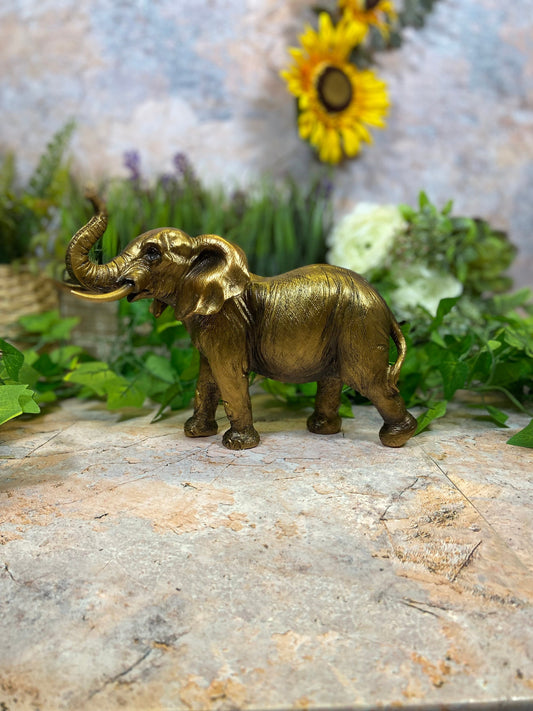 Gold Effect Resin Elephant Statue 24cm Elegant Home Decor Symbol of Strength Wild Animal Sculpture