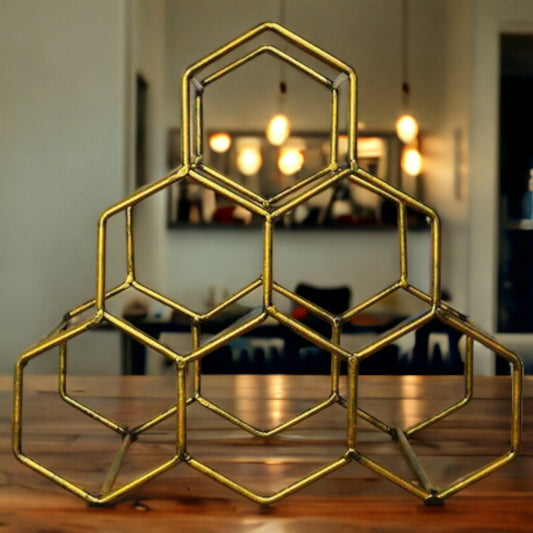 Casier à vin géométrique en nid d'abeille - Porte-bouteilles élégant - Présentoir à bouteilles hexagonal doré moderne - Rangement de bar chic - Organisateur de vin peu encombrant